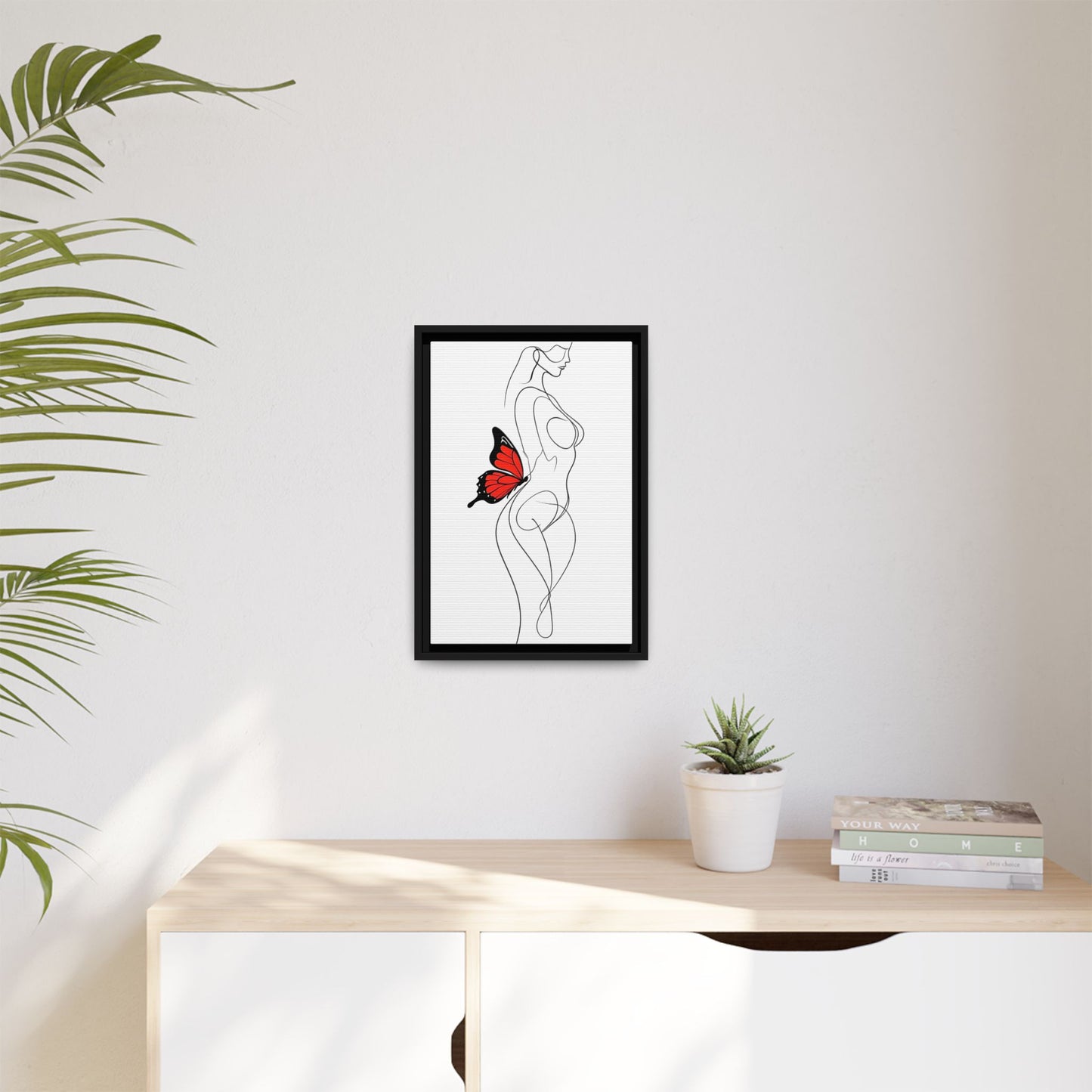 Elegant Minimalist Line Drawing of a Woman with a Butterfly Canvas Art